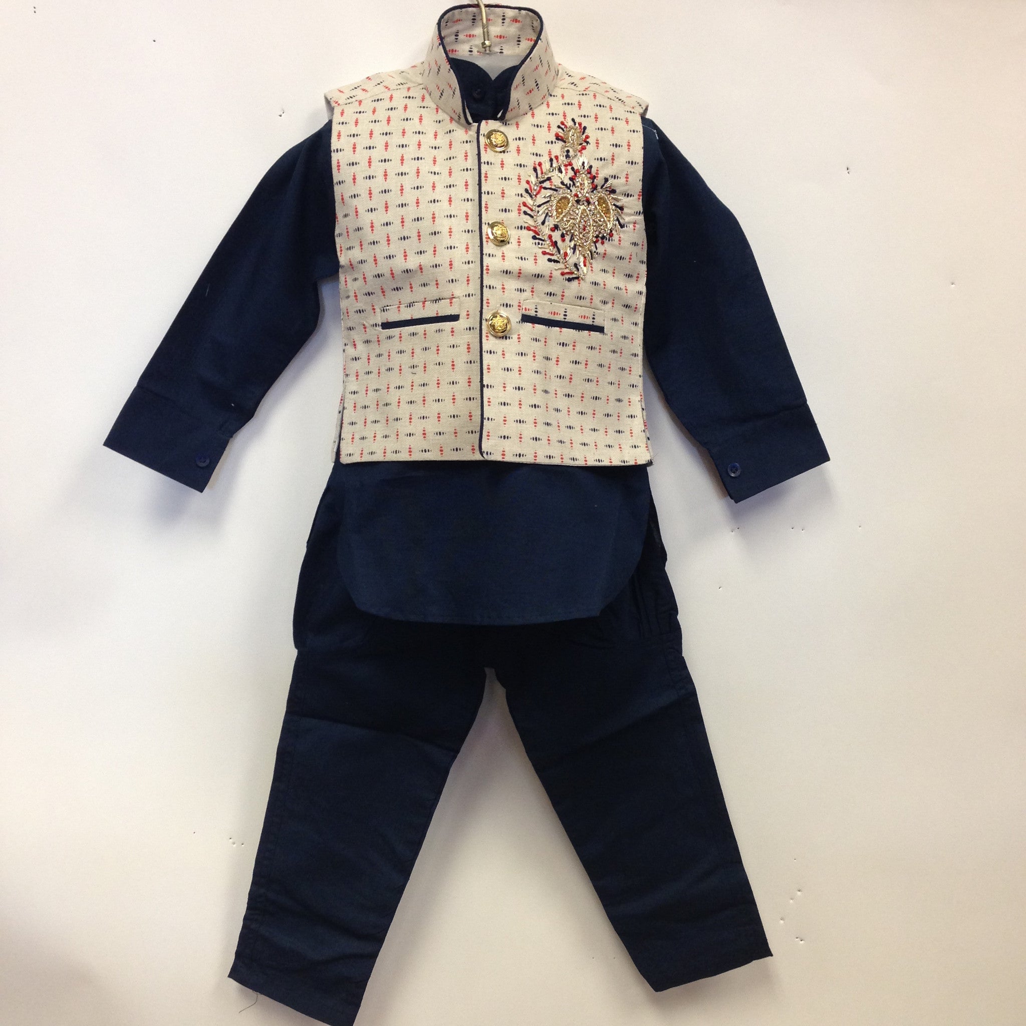 Boys cream coat discount