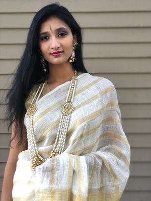 Offwhite linen with Gold Zari Sari